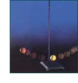 Yellow ball on pendulum hits red ball swinging back